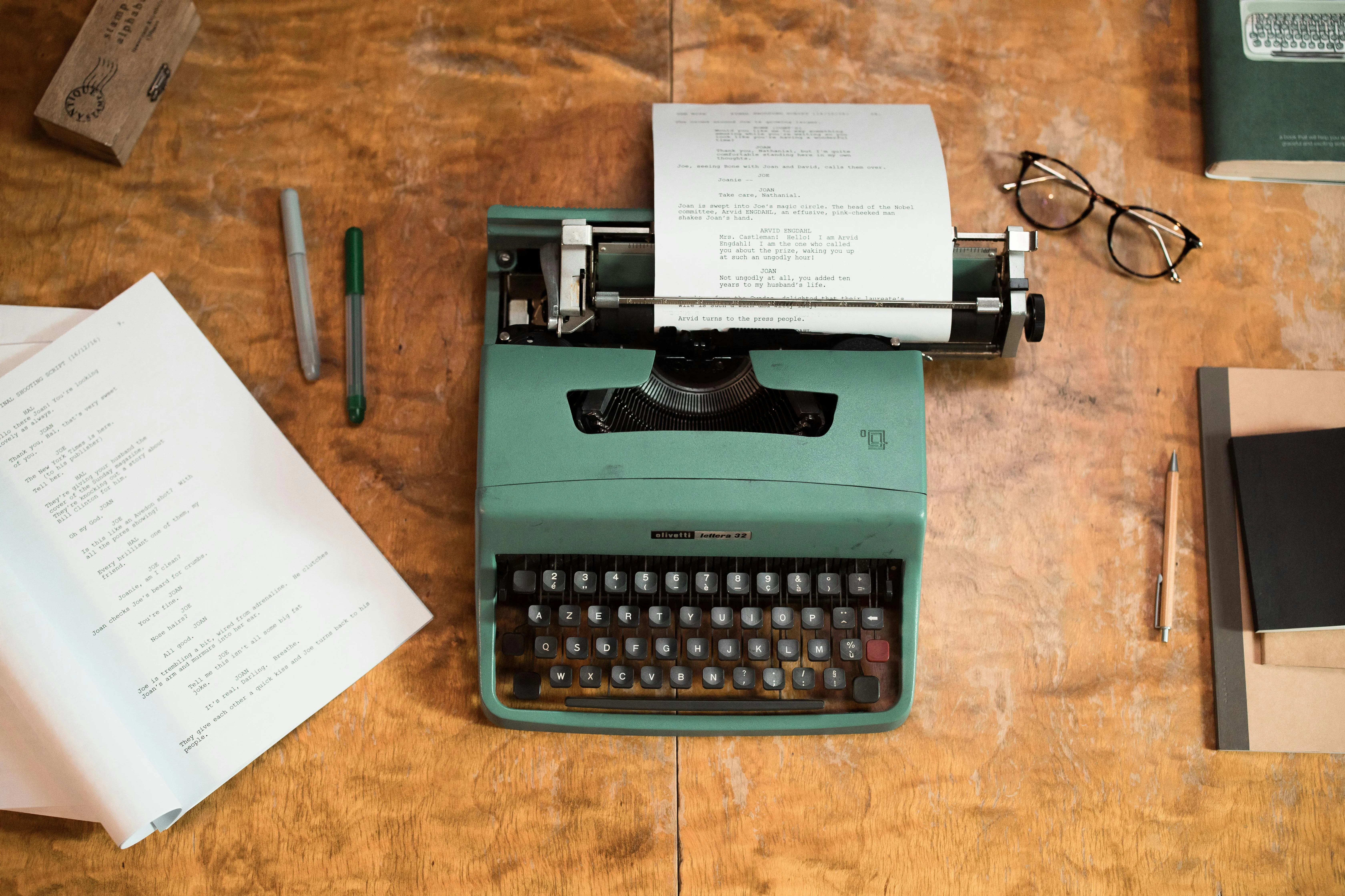 A typewriter on a desk